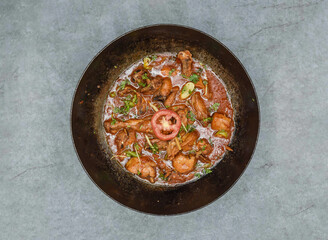 Chicken namkeen karahi korma masala served in dish isolated on background top view of indian spices and pakistani food