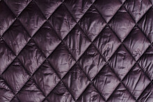 Quilted Fabric Background Texture Blanket Or Puffer Jacket.padded, Down Jacket. Background Of Urban Winter Outfit.Quilted Pattern.Banner.