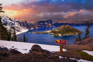 Wall Mural - Sunset above Crater Lake and Wizard Island with 'Danger Keep Back' warning sign in Crater Lake National Park, Oregon, USA