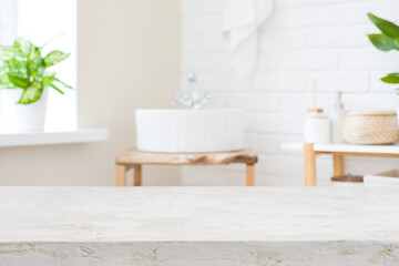 Wall Mural - handmade table top for product display in blur bathroom interior