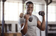 © C.D./peopleimages.com - Exercise, dumbbells and portrait of a black man at gym for fitness, training workout and strong muscle. African athlete or bodybuilder person with weights for bicep power and performance at a club