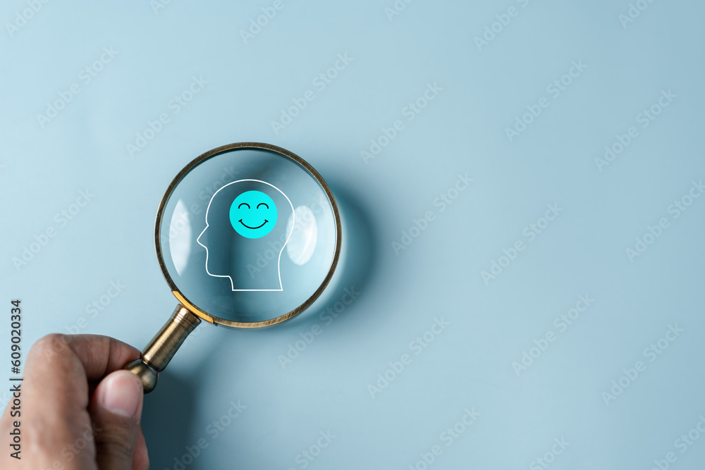 Magnifier focus to human brain and smile mental health sign positive ...