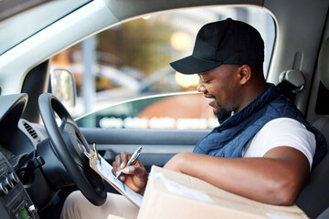 Aufkleber - Delivery man, transport and black man writing on a clipboard with a smile for shipping or courier service. Happy african person or driver with cardboard box or package and management list in a van