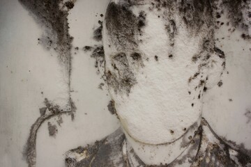 Canvas Print - Anonymous face stone carving