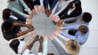 © Katsiaryna - Friends with stack of hands showing unity and teamwork.