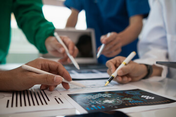 Wall Mural - concept of mobilizing ability of medical team in conference room to diagnose and treat disease correctly. medical team joins meeting and discusses  patient illness in order to treat it correctly