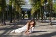 © @skuder_photographer - Latin woman, young and beautiful dancing modern dance in the street in a park and makes different expressions and postures. Concept dance, hip hop, dance, art, action, beauty, youth art.