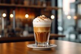 a glass glass of latte macchiato coffee on a table in a cafe. AI generated