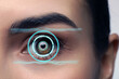 Vision test. Laser reticle focused on woman's eye, closeup