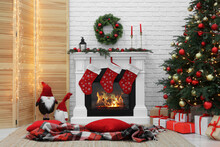 Cosy Room With Tree And Fireplace Decorated For Christmas. Interior Design