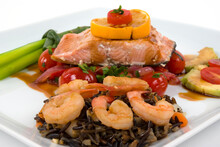 Salmon,asparagus, Wild Rice With Shrimp, Onion,roasted Peppers And Tomatoes With Pomegranate Sauce