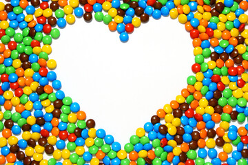 Wall Mural - Colorful candy background making heart shape from my Valentine series