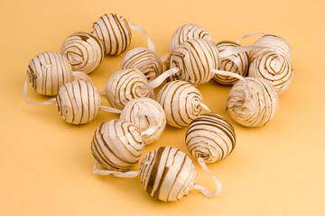Poster - Multiple decorative balls against a plain background.