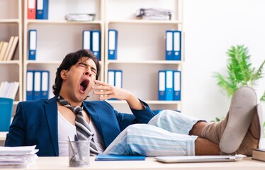 Wall Mural - Employee coming to work straight from bed