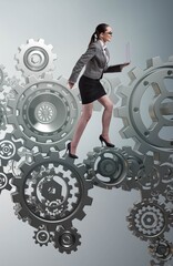 Wall Mural - Woman businesswoman walking in cogwheels