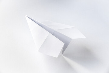 Wall Mural - paper plane origami isolated on a white background