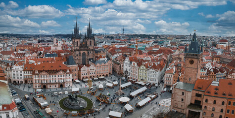 Wall Mural - Panoramic aerial view of old Town square in Prague on a beautiful summer day, Czech Republic. Church of our Lady before Tyn and Prague Astronomical Clock Tower