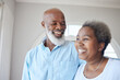 © Siphosethu F/peopleimages.com - Senior black couple, smile and together in a happy home with love, care and commitment. Face of an african woman and man thinking about marriage, retirement lifestyle and happiness with a hug