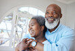 © Siphosethu F/peopleimages.com - Senior black couple, hug and together in a home with love, care and commitment. Face of african woman and man thinking about happy marriage, retirement lifestyle and happiness or life insurance