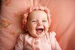 © Nataliya - Joyful baby captured mid-giggle, baby Generative AI