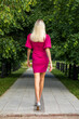 © Andrey_Arkusha - Fashion portrait of a young beautiful blonde woman in a burgundy dress