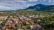 © kami - aerial shot of Boulder Colorado with Broadway street and flatirons mountain