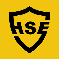 HSE concept. Black shield icon with text. Health safety and environment. Vector illustration flat design. Isolated on yellow background.