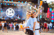 © maxbelchenko - Happy girlfriends having fun at music festival. Summer holiday, vacation concept. Friendship and celebration concept.