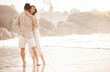 © Azeemud-Deen Jacobs/peopleimages.com - Beach, dancing and happy couple with love, hug and summer celebration, holiday or vacation. Woman with partner or people dance, celebrate and excited in ocean or sea, travel happiness and laughing