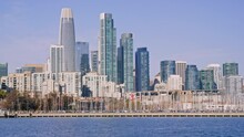 Downtown San Francisco Skyline With Boat Dock Filled With Sailboats At Rest