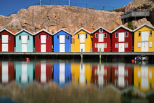 Colorful Boathouses In Smögen On The Swedish West Coast. Popular Tourist Destination.