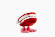 Classic chattering teeth wind-up toy. Comedy novelty item.