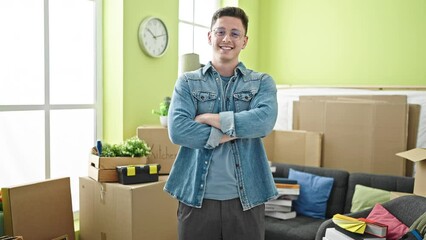 Sticker - Young hispanic man smiling confident standing with arms crossed gesture at new home