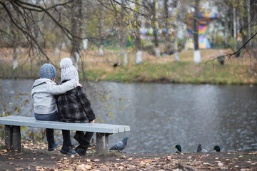 Wall Mural - Children walk in the autumn park