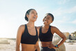 © K.A./peopleimages.com - Fitness friends laughing at beach, women workout together with happiness and active lifestyle outdoor. Exercise in nature, healthy and happy with female people have funny conversation while training