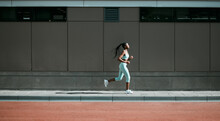 Black Woman, Running And City Sport On Sidewalk With Training, Exercise And Fitness On Road. Street, Urban Runner And Female Athlete With Mockup And Body Workout For Health, Wellness And Race Outdoor