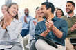 © Matthew Cerff/peopleimages.com - Business people, applause and staff in a workshop, funny or teamwork with collaboration, support or success. Coworkers, audience or group clapping, humor or seminar for corporate training or laughing