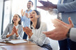 © Matthew Cerff/peopleimages.com - Motivation, audience with an applause and in a business meeting at work with a lens flare together. Support or celebration, success and colleagues clapping hands for good news or achievement