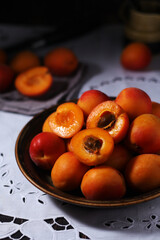 Wall Mural - Fresh ripe apricots in bowl in rustic style