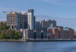 The pier Kvarnholmen with skyscraper apartment houses in the district Nacka, a sunny summer day in Stockholm
