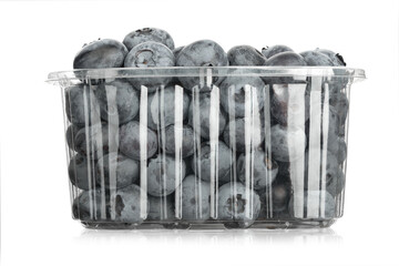 Canvas Print - Fresh blueberries in a plastic container, isolated on a white background.