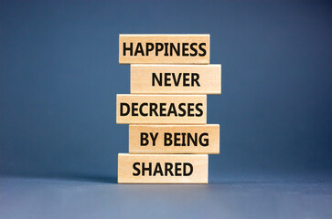 Wall Mural - Happiness symbol. Concept words Happiness never decreases by being shared on wooden block. Beautiful grey table grey background. Motivational Happiness concept. Copy space.