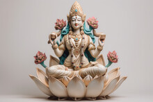 Statue Hindu Goddess Lakshmi With Flowers - Goddess Of Wealth And Fortune