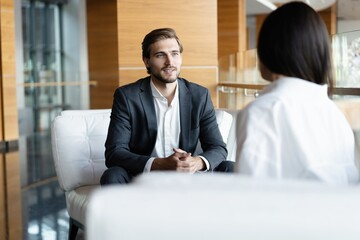 Job interview, businessman listen to candidate answers.