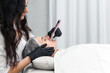 © Yekatseryna - cosmetologist making mesotherapy injection with dermapen on face for rejuvenation. Anti-aging treatment and face lift in cosmetology clinic. medical procedure with Electric pen. banner with copy space