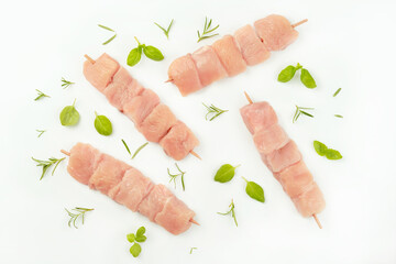 Chicken breast Fillets.Ogranic food,healthy eating.Procurement for designers.Skewers from raw chicken meat fillet for supermarket on white background.Food for retail.Chicken skewers.Raw chicken.