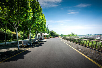 Sticker - Asphalt road in modern city park