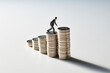© amanaimages - お金の階段を登るビジネスマン