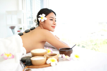 Wall Mural - Spa beauty massage healthy wellness.  Spa Thai therapy treatment aromatherapy for body woman. Young woman enjoying and relax massage in spa salon. Lifestyle and Cosmetic Healthy Concept