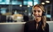 © Igor - Portrait of happy smiling female customer support phone operator at workplace. Young blonde call center agent with headset with microphone looking at camera. AI generated